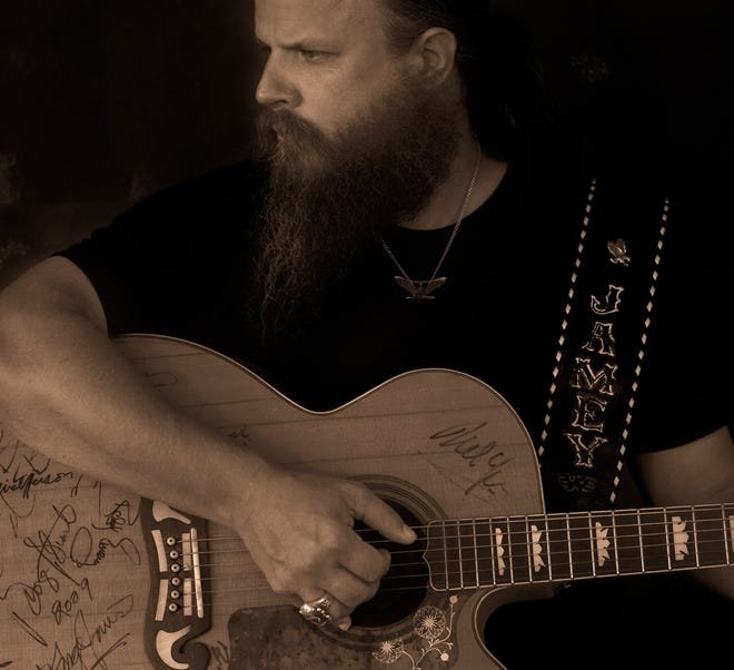 Country singer Jamey Johnson, who's written hits for George Strait and Trace Adkins among others, is to perform at the Ohio State Fair on Aug. 3.