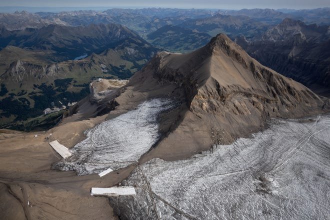 This aerial picture shows the Tsanfleuron pass in Switzerland free of the ice that had covered it for at least 2,000 years.