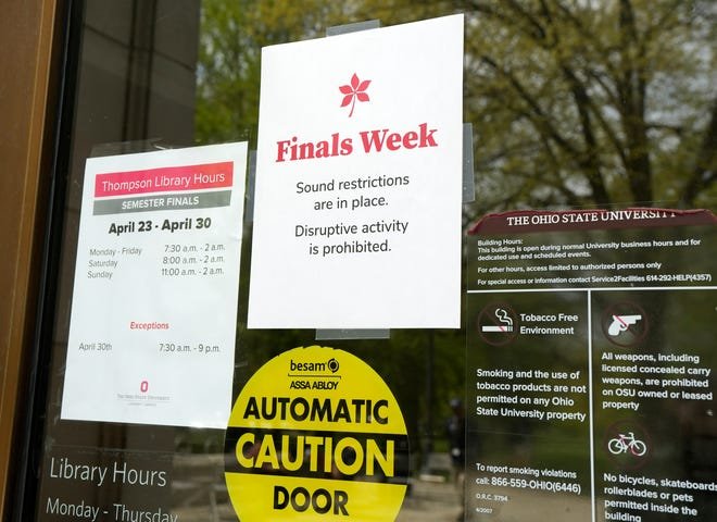 A sign posted on Thompson Library regarding finals week warns patrons that “disruptive activity” is prohibited.