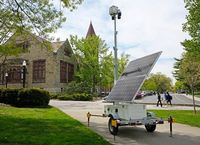 Campus was quiet on Friday with many students enjoying the beautiful spring weather in the 70s and studying or taking finals. Mobile security cameras and banks of lights remained on the South Oval where 36 people were arrested Thursday night at an anti-Israel protest.