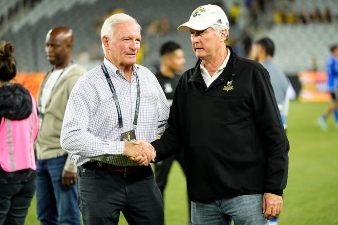 Apr 27, 2024; Columbus, Ohio, USA; Columbus Crew owners Jimmy Haslam, left, and Pete Edwards shake hands following the MLS match against CF Montreal at Lower.com Field. The teams played to a 0-0 draw.