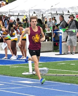 Westerville North's Ben Gabelman won the 1,600 a day after anchoring the state-champion 3,200 relay.