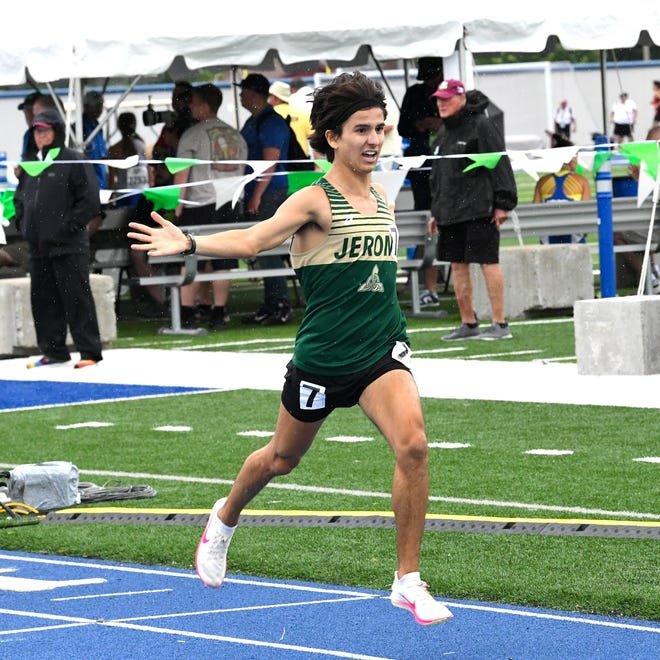 Sam Ricchiuti of Dublin Jerome cruises through the raindrops to a first-place finish in the 3,200 meters at the Division I state meet Saturday.