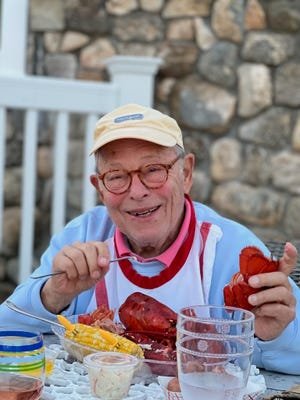Longtime Bexley Mayor David Madison in his later years enjoying lobster with family in this handout photo from his family. Madison died Saturday, June 1, 2024, at age 92.